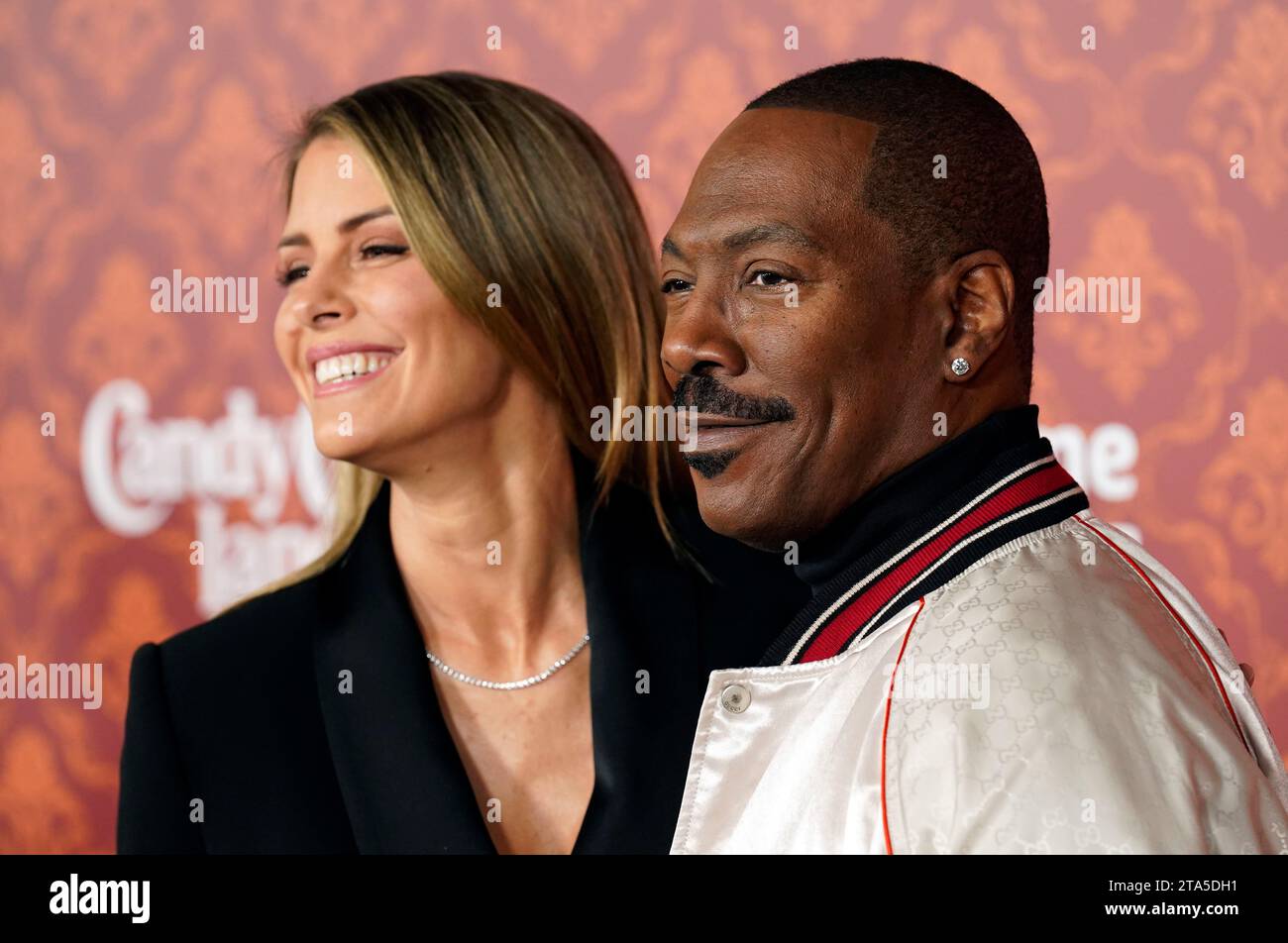 Eddie Murphy, right, and Paige Butcher pose together at the premiere of