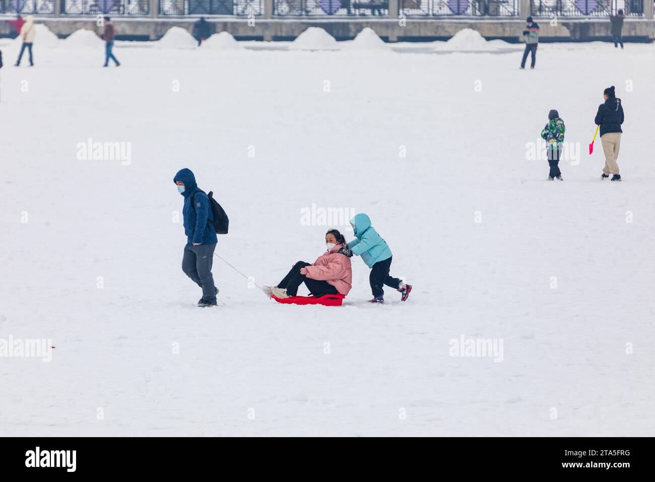 People brave the snow to walk outside in Jilin City, northeast China's ...