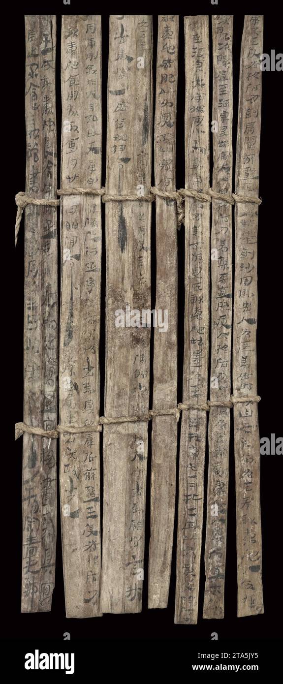 (231129) -- LANZHOU, Nov. 29, 2023 (Xinhua) -- This undated photo shows a work of 'Jiandu'. 'Jiandu' are the bamboo and wooden slips on which ancient Chinese people wrote using ink and brushes before the invention of paper.The Gansu Jiandu Museum is China's only provincial-level museum focusing on bamboo and wooden slips. It has a collection of nearly 40,000 such slips dating back to the Qin Dynasty (221-207 B.C.) and Western Jin Dynasty (265-317), and it also houses more than 10,000 other artifacts, including paper, textiles, woodenware, lacquerware and ironware. (Gansu Jiandu Museum/Handout Stock Photo