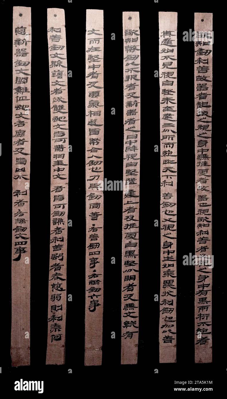 (231129) -- LANZHOU, Nov. 29, 2023 (Xinhua) -- This undated photo shows a work of 'Jiandu'. 'Jiandu' are the bamboo and wooden slips on which ancient Chinese people wrote using ink and brushes before the invention of paper.The Gansu Jiandu Museum is China's only provincial-level museum focusing on bamboo and wooden slips. It has a collection of nearly 40,000 such slips dating back to the Qin Dynasty (221-207 B.C.) and Western Jin Dynasty (265-317), and it also houses more than 10,000 other artifacts, including paper, textiles, woodenware, lacquerware and ironware. (Gansu Jiandu Museum/Handout Stock Photo