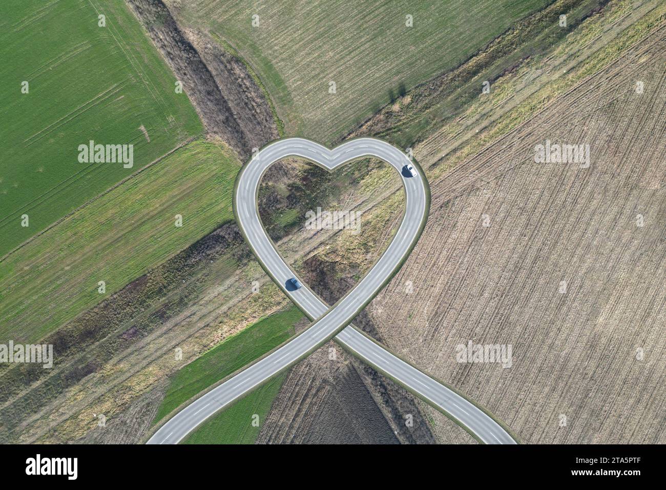 Heart shaped road, as a symbol of love and care. Stock Photo