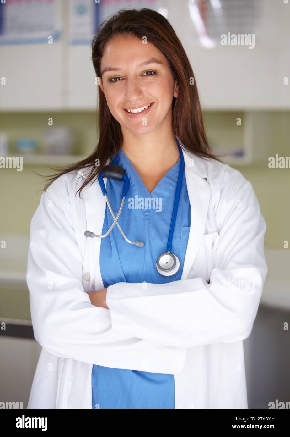 Happy woman, portrait and veterinarian professional doctor at clinic for animal care, shelter or healthcare service. Female person, nurse or pet Stock Photo