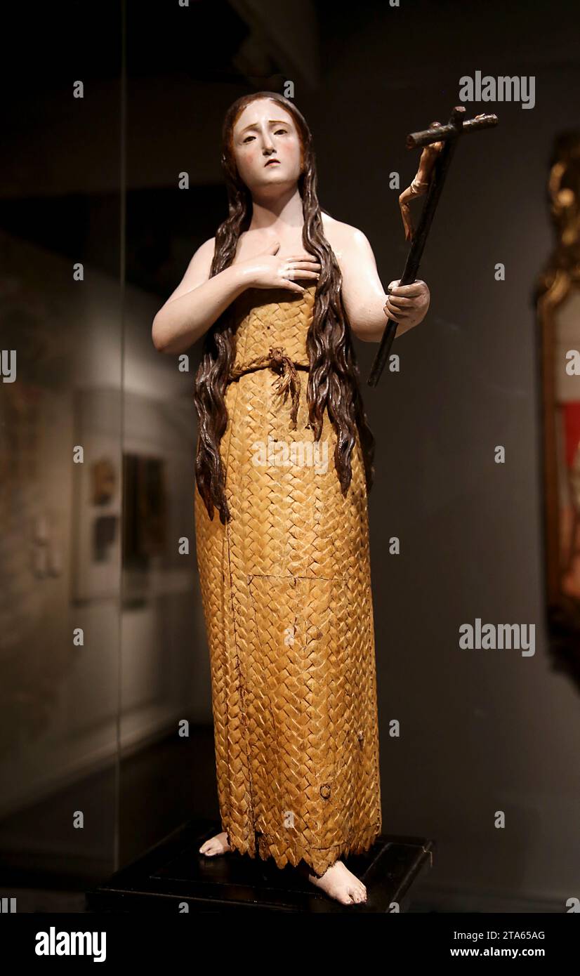 Penitent Mary Magdalene. C. 1664. Sculpture by Pedro de Mena (1628-1688). Polychromed wood. Museu Marés, Barcelona, Catalonia, Spain. Stock Photo