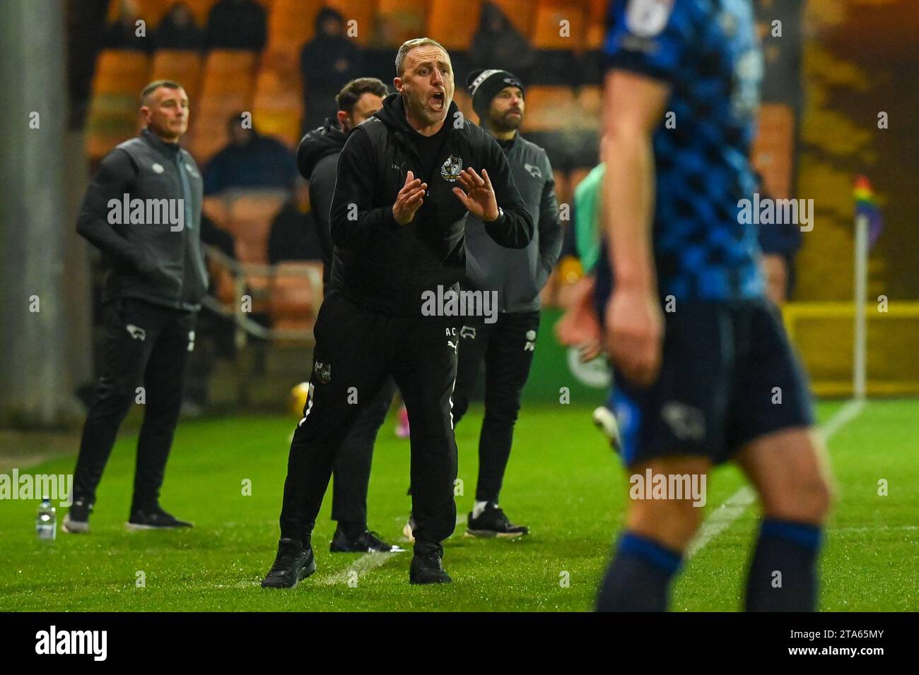 Burslem, UK, 28th November 2023. Port Vale Manager Andy Crosby pictured during the 1-0 home defeat to Derby County Credit: TeeGeePix/Alamy Live News Stock Photo
