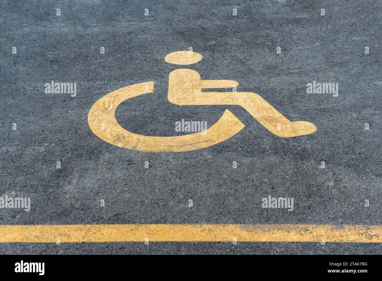 Parking space reserved for blue badge holders Stock Photo