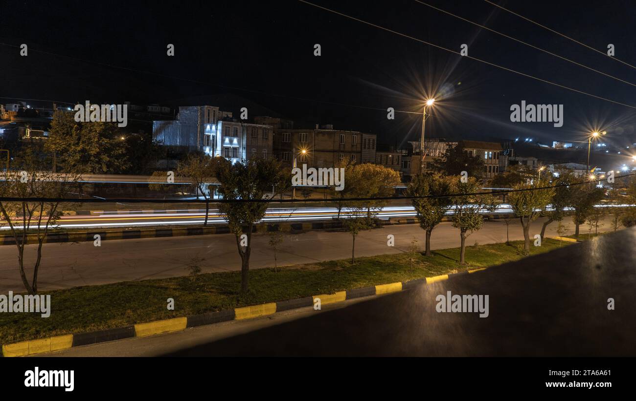 Night view of cars on the street with high shutter speed Stock Photo