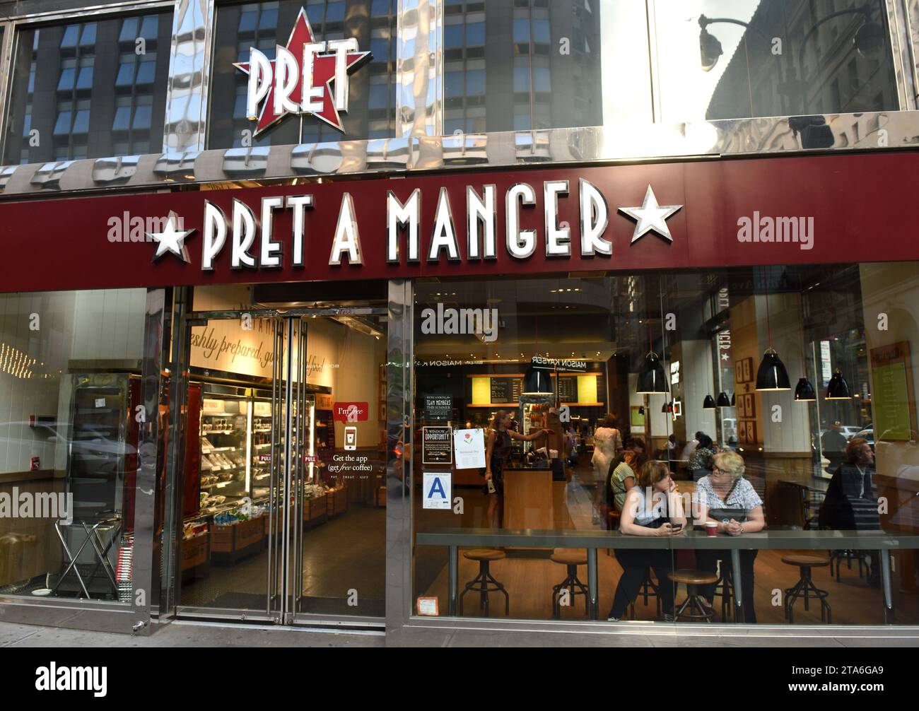New York, USA - May 26, 2018: People in fast casual restaurant Pret A Manger in Manhattan in New York. Stock Photo