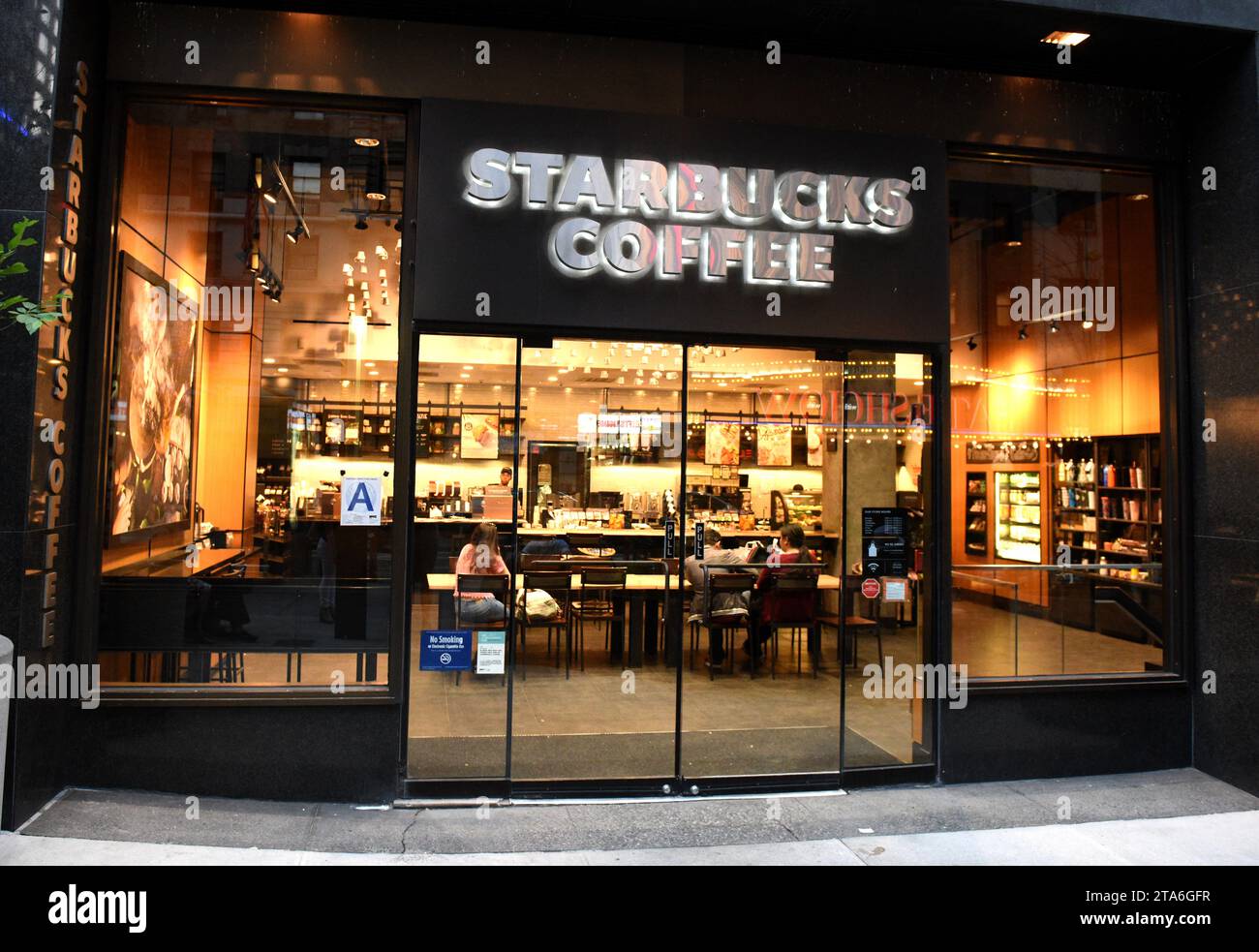 New York, USA - May 26, 2018: Starbucks Coffee in Midtown of Manhattan in New York. Stock Photo