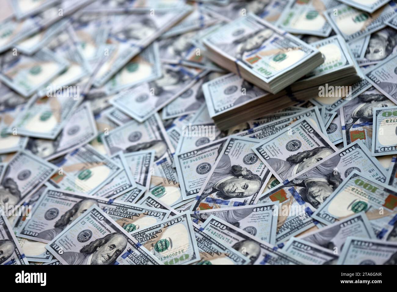 Very big amount of US hundred dollar bills close up. Huge quantity of