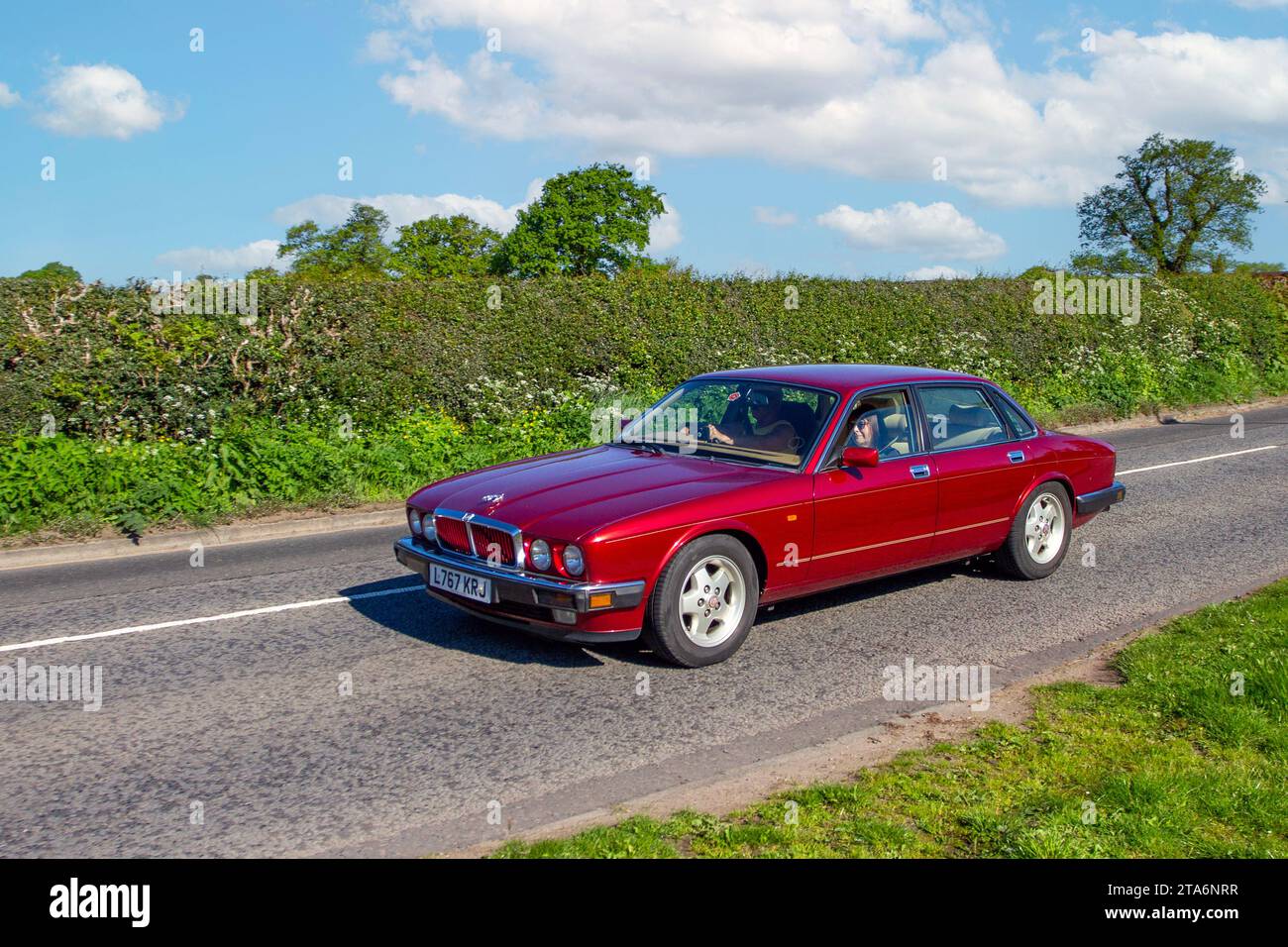 1994 90s nineties Red Jaguar Xj6 3.2 S Auto Car Saloon Petrol 3239 cc; Vintage, restored classic motors, automobile collectors motoring enthusiasts, historic veteran cars travelling in Cheshire, UK Stock Photo