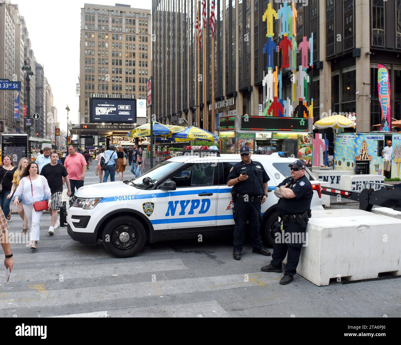 NEW YORK, USA - May 27, 2018: The New York City Police Department (NYPD) police officers performing his duties on the streets of Manhattan. Stock Photo