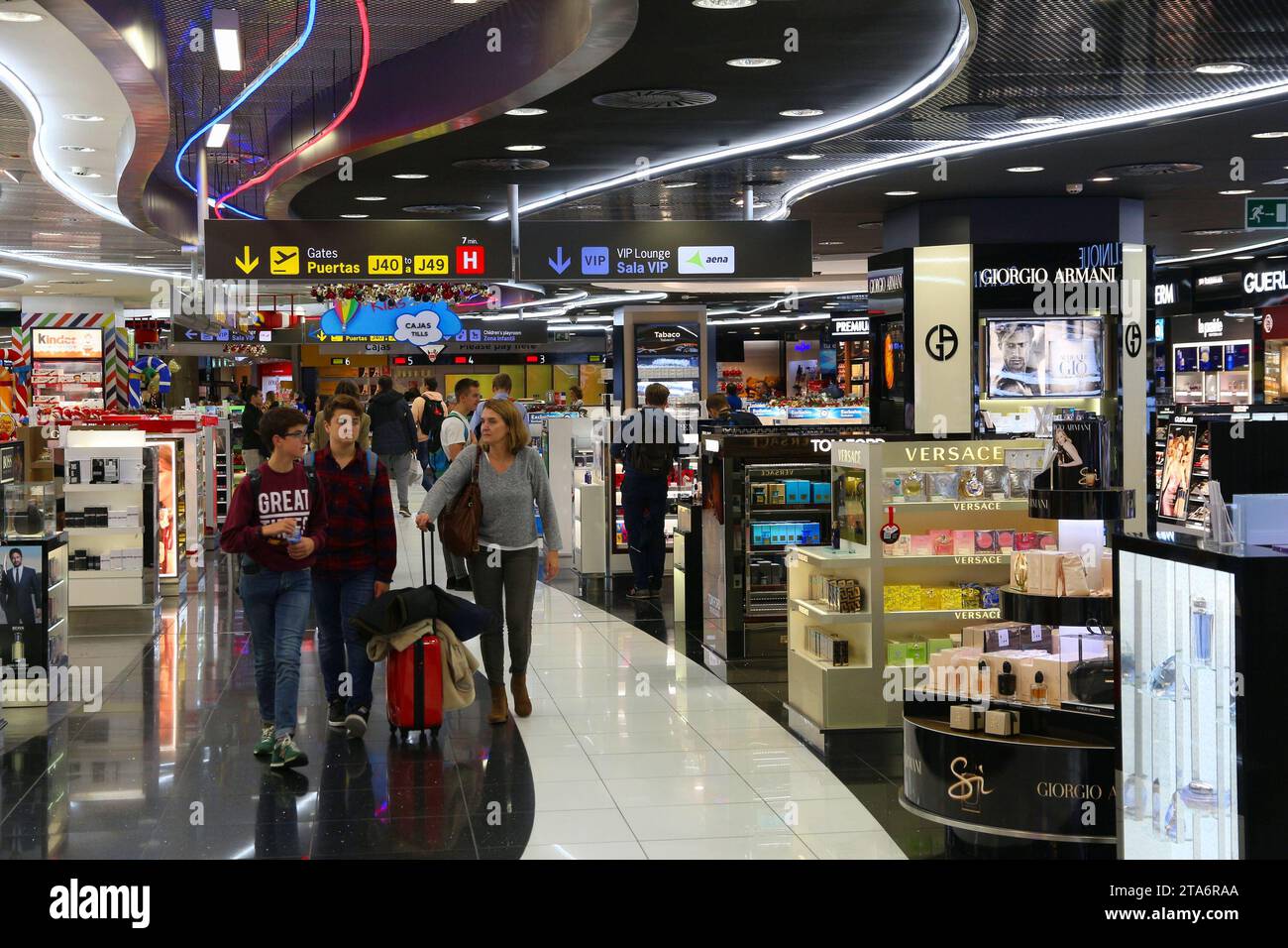 MADRID, SPAIN DECEMBER 6, 2016 Passengers visit duty free shops at