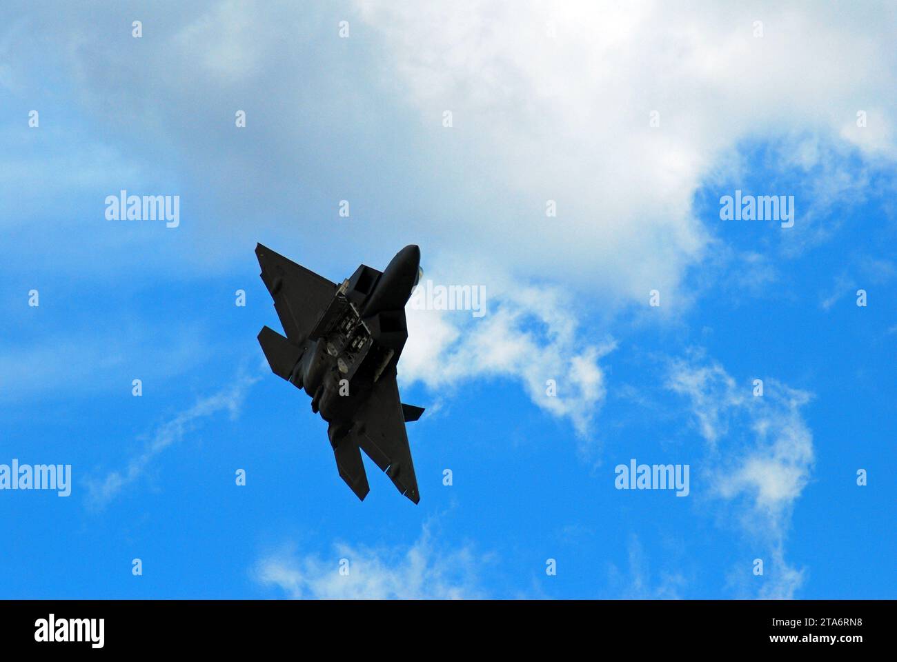 An F 22 Raptor races across the sky Stock Photo