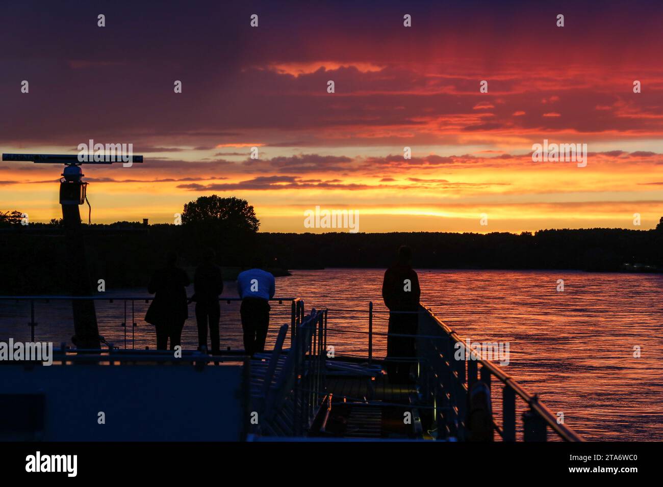 Magnificent sunset on Danube seen from a river cruise ship near Vukovar, eastern Slavonia region,at the border between Croatia (left) & Serbia (right) Stock Photo
