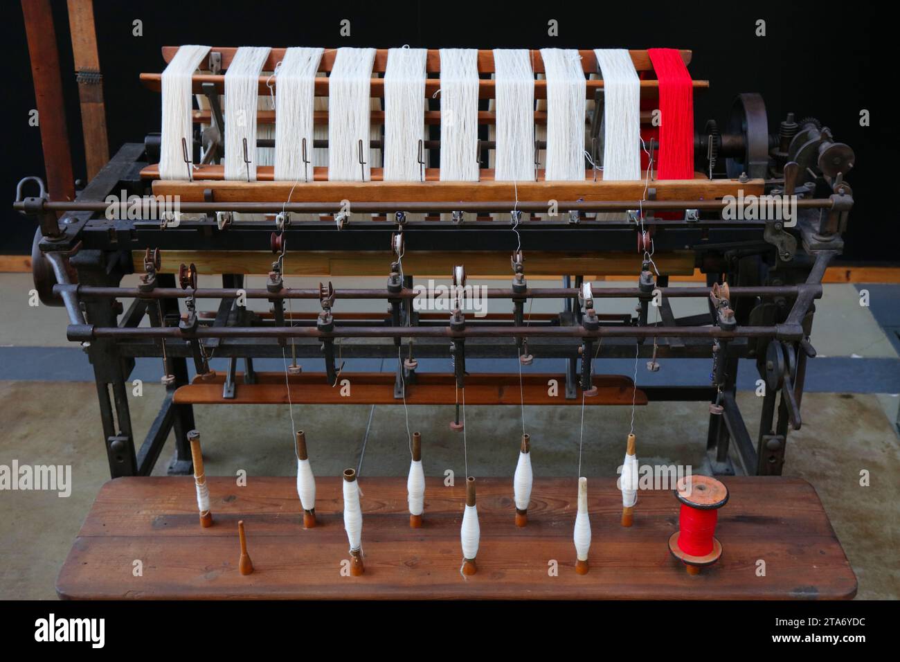 Textile factory machinery. Old loom machine. Historic textile industry