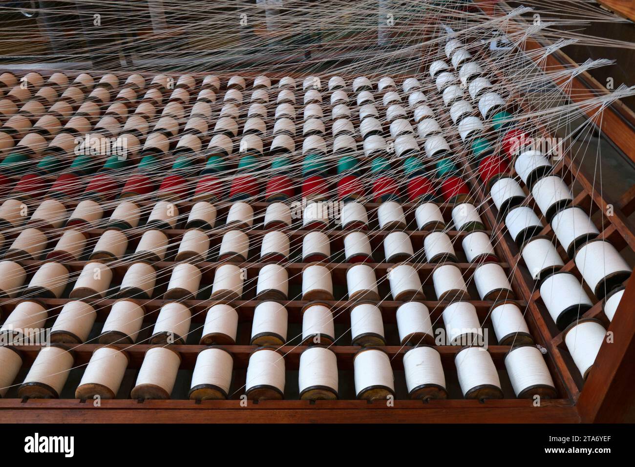 Textile factory machinery. Old loom machine. Historic textile industry