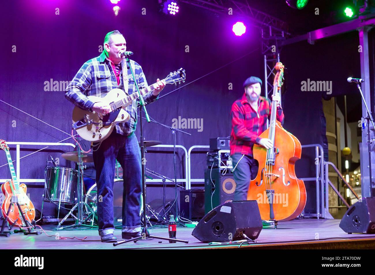 The rockabilly band Relentless performing on stage at the Christmas Market in Boston Stock Photo