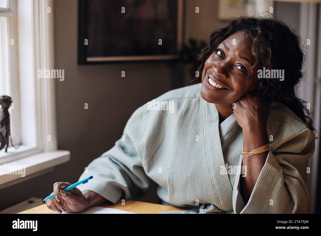 Mature woman head in hands hi-res stock photography and images - Alamy