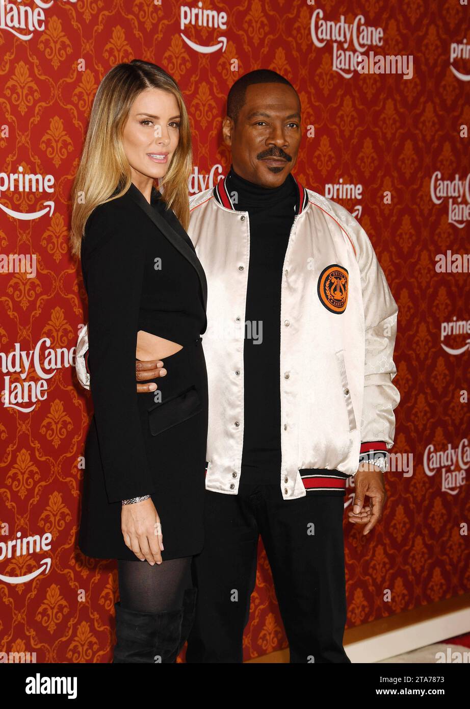 LOS ANGELES, CALIFORNIA NOVEMBER 28 Paige Butcher and Eddie Murphy