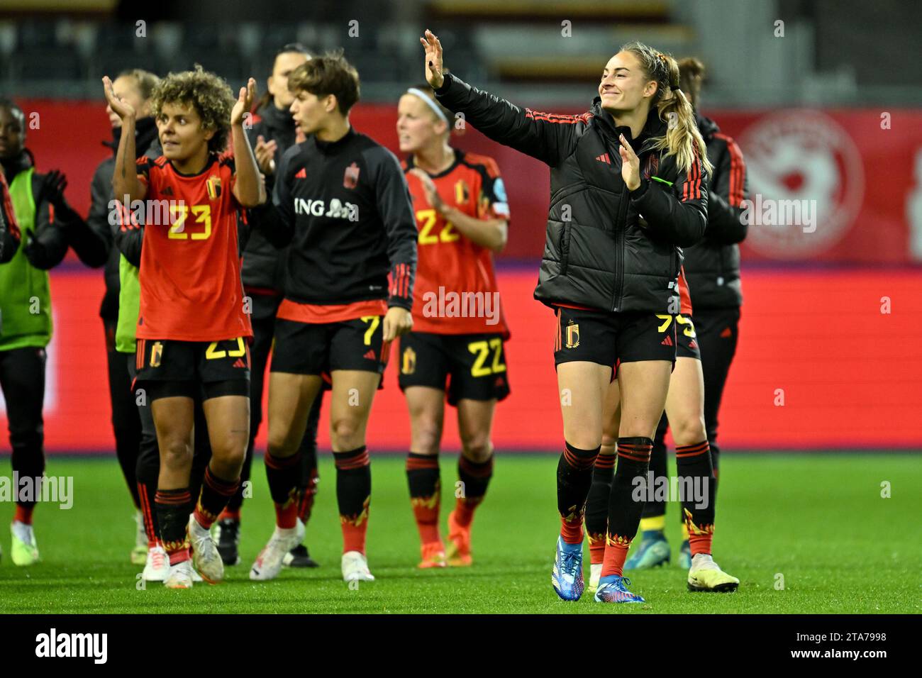 players of Belgium with Tessa Wullaert (9) of Belgium celebrate after winning a football match between the national women team of Belgium, called the Red Flames and England , called the Lionesses on matchday 4 in the 2023-24 UEFA Women's Nations League competition in group A1 , on Tuesday 31 October 2023 in Leuven, Belgium. Photo Stijn Audooren | Sportpix Stock Photo