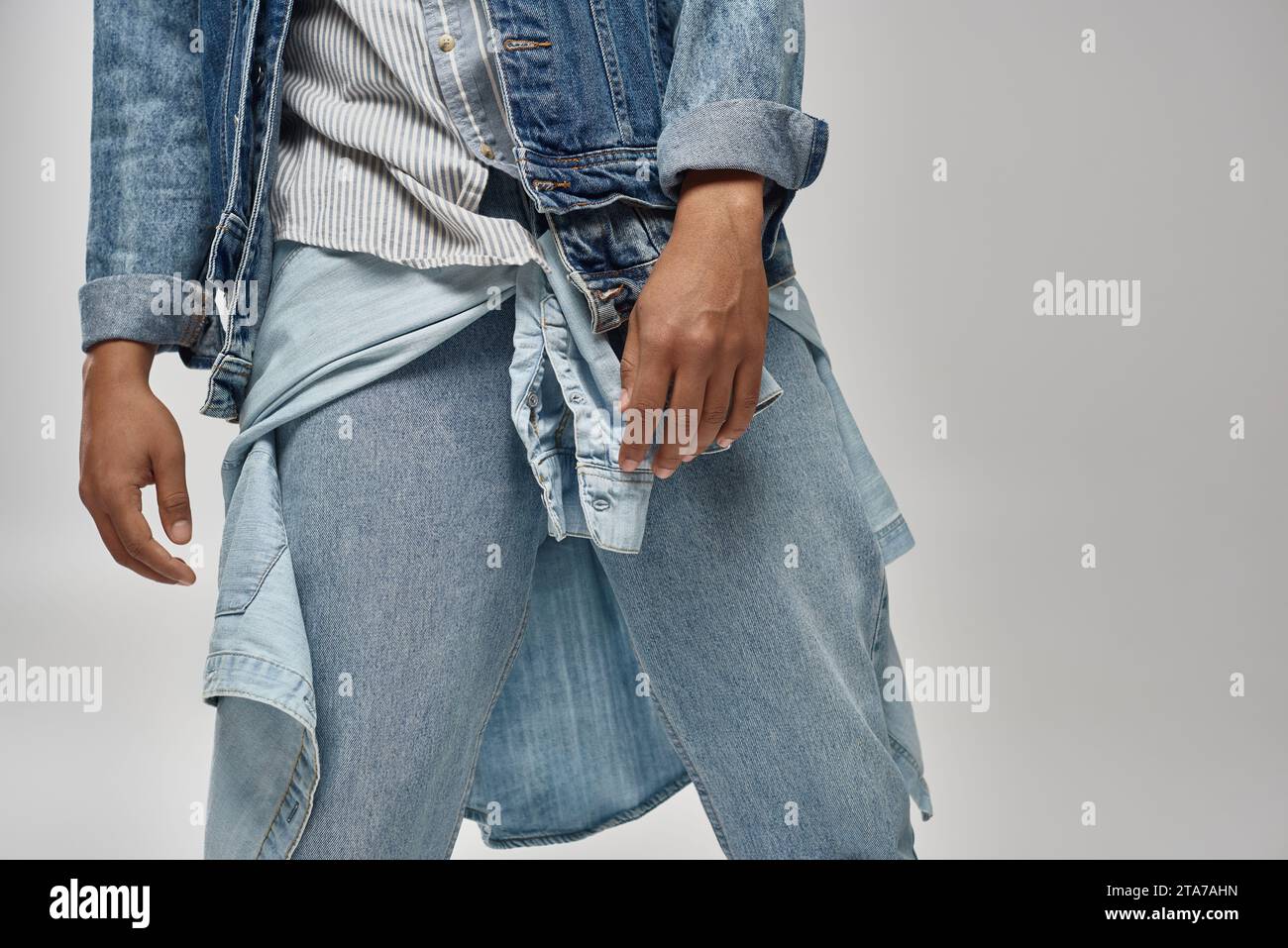 cropped view of stylish african american male model posing in trendy denim outfit, fashion concept Stock Photo