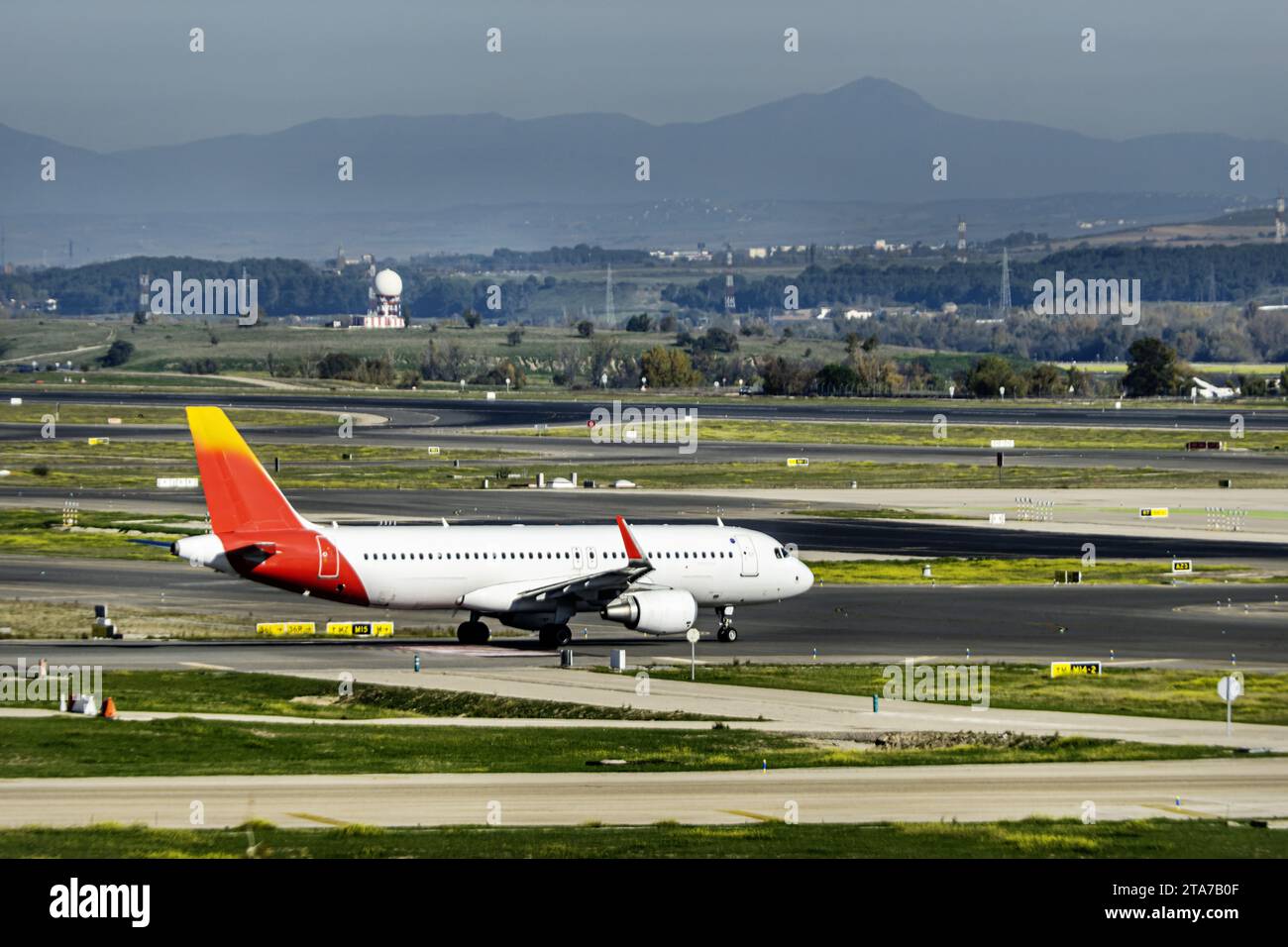 Airplanes transiting the runways approaching the takeoff area Stock Photo
