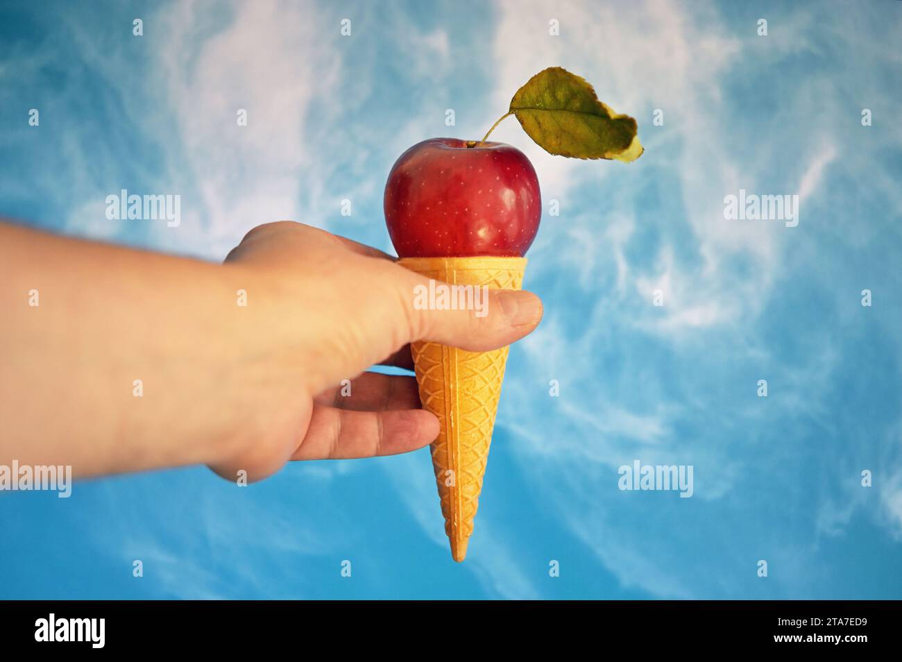 Conceptual Vegan Ice Cream cone with Apple fruit Stock Photo