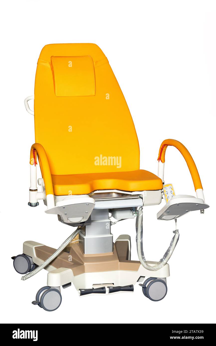 Gynecological chair with adjustable backrest, orange upholstery and control panel. Isolated on white. Stock Photo