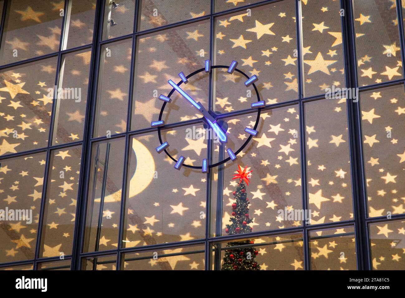 clock of the central station during Christmas time, Christmas illuminated ceiling, Cologne, Germany. Uhr am Hauptbahnhof waehrend der Weihnachtszeit, Stock Photo