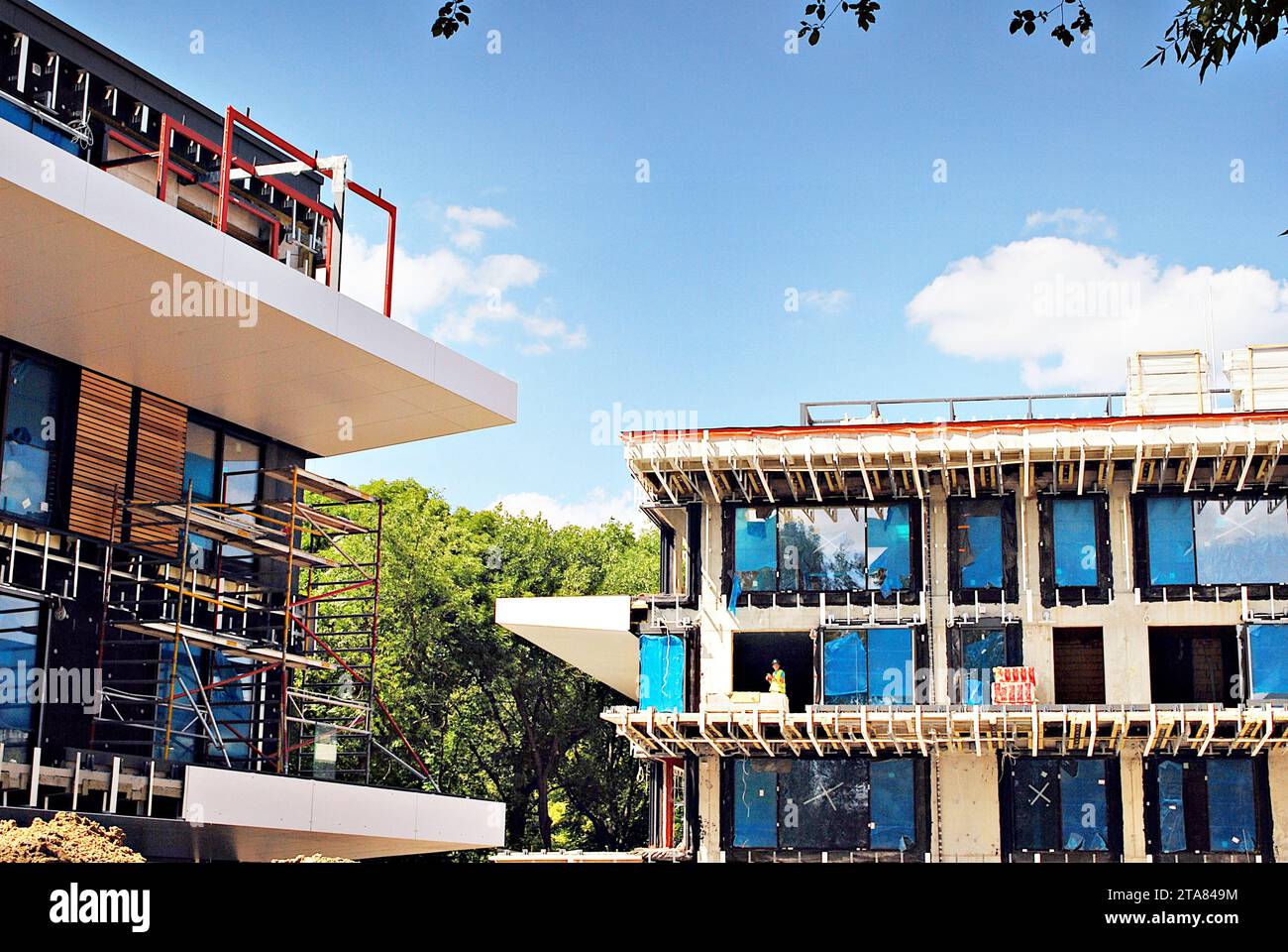 Residential building under construction. Building under construction against blue sky Stock Photo