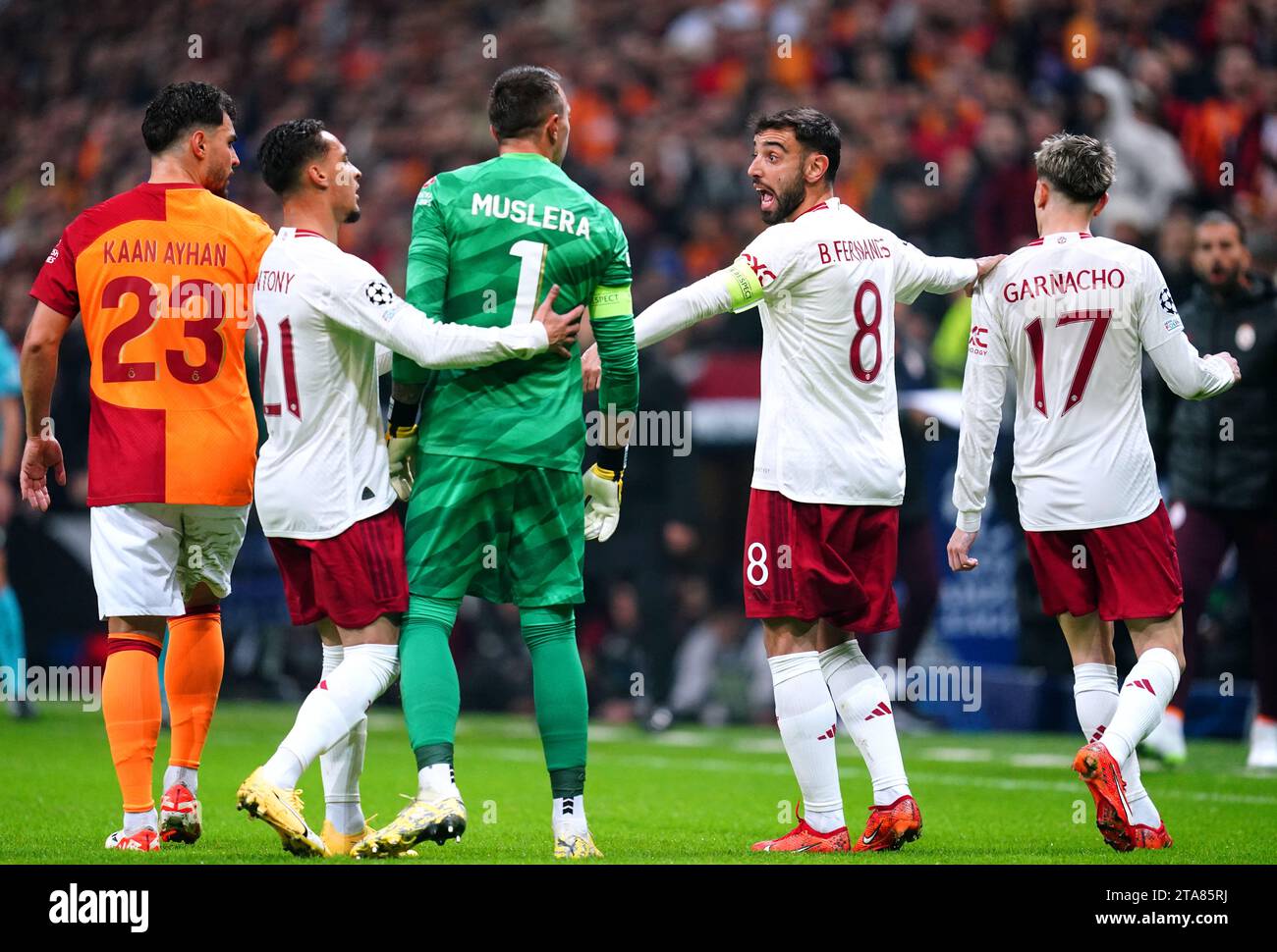 Galatasaray goalkeeper Fernando Muslera exchanges words with Manchester United's Alejandro Garnacho during the UEFA Champions League Group A match at RAMS Park, Istanbul. Picture date: Wednesday November 29, 2023. Stock Photo
