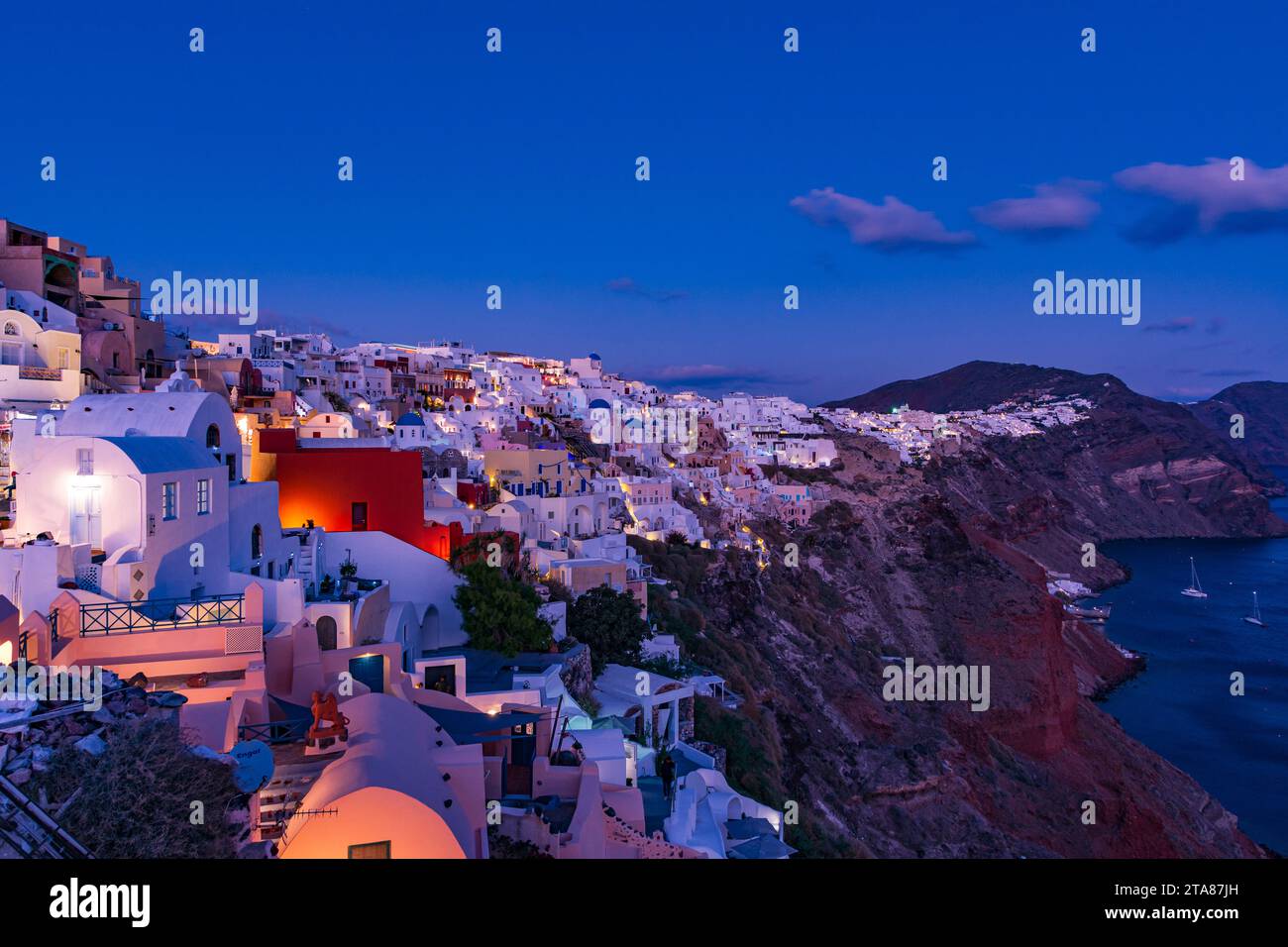 The picturesque village of Oia at nightfall, Santorini Stock Photo