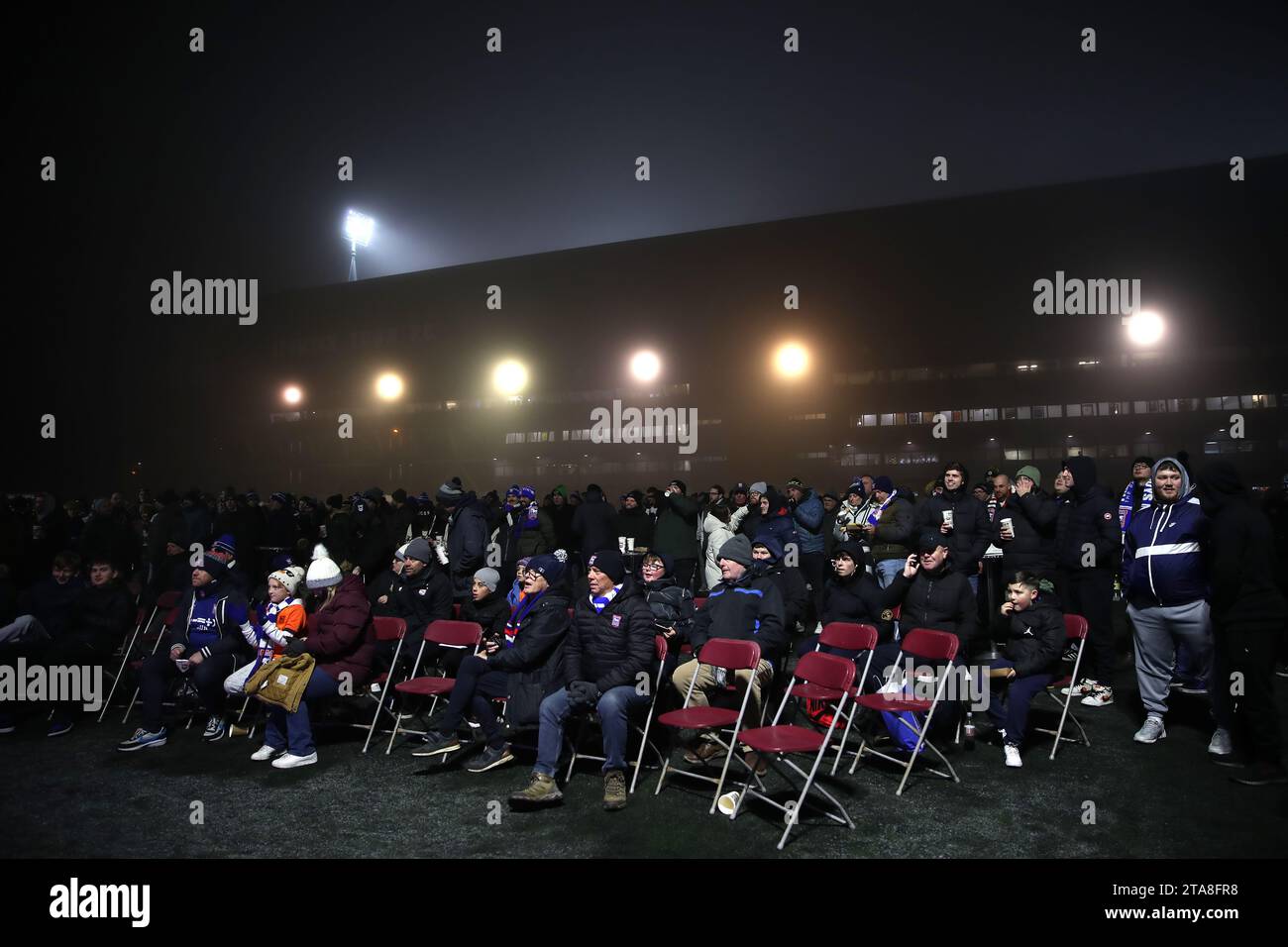 Ipswich Town fans in the fanzone watch the UEFA Champions League