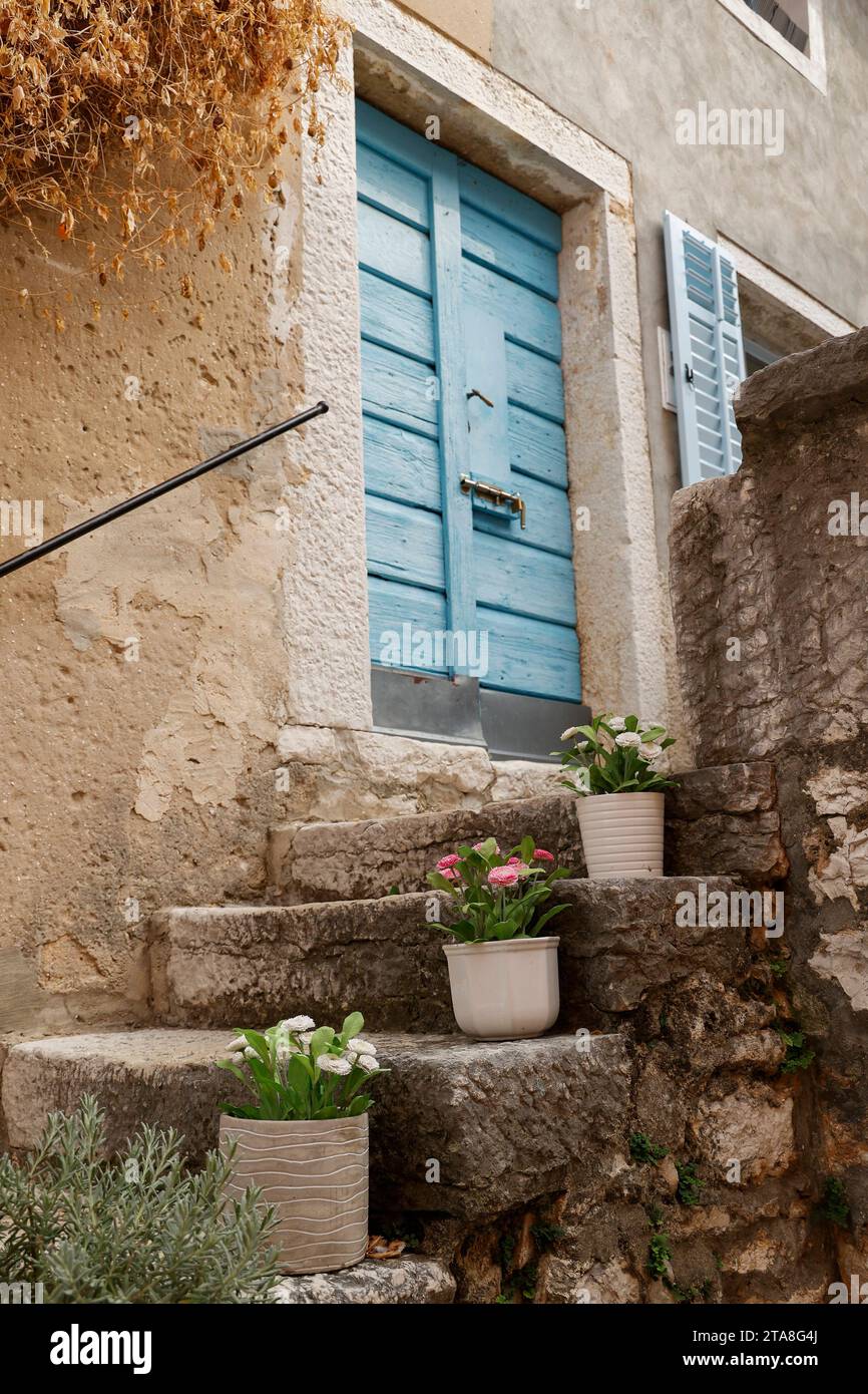 Blue wooden door of old stone house in Vrsar,(Orsera), Istria, Croatia ...