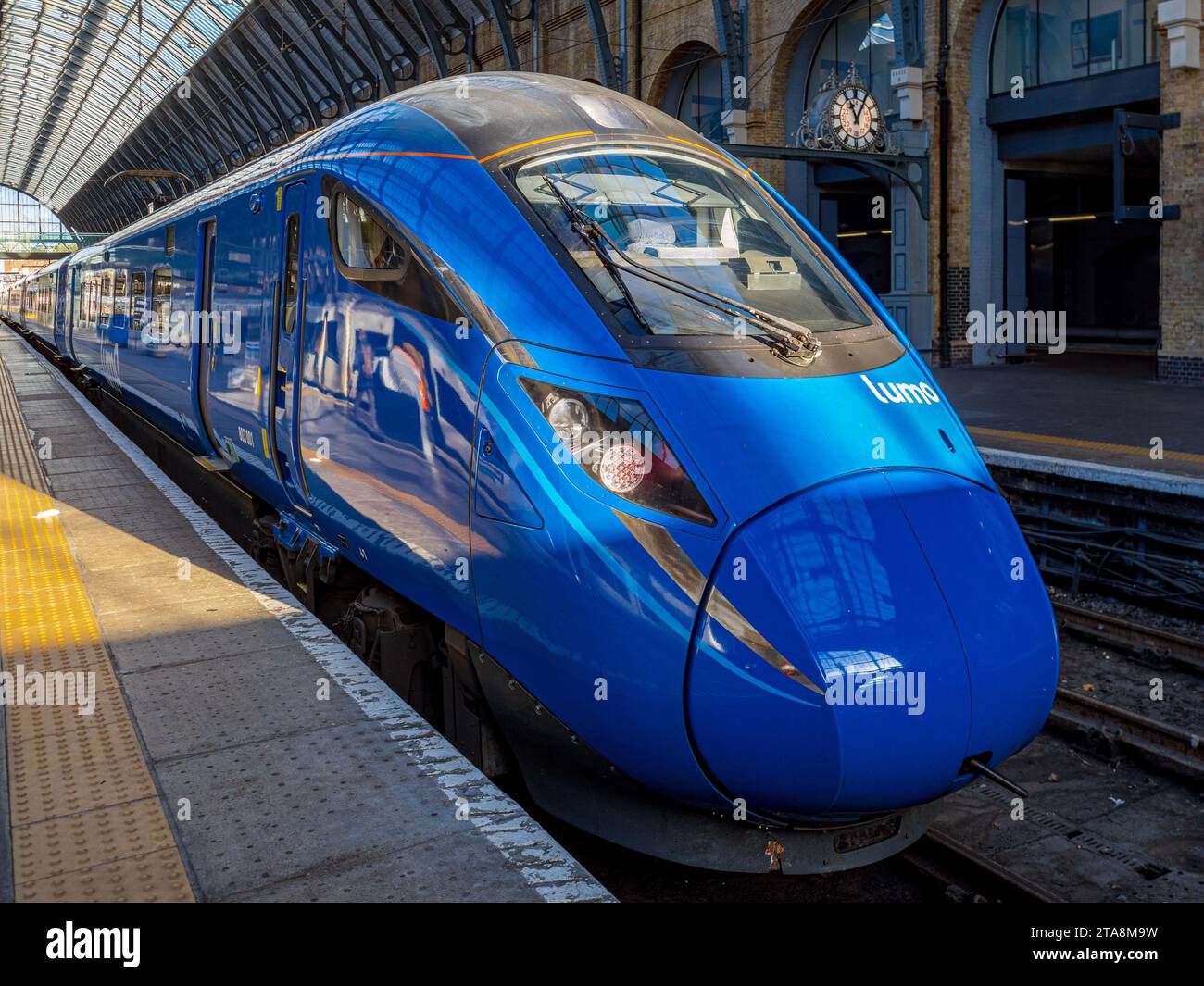 Lumo Train at London Kings Cross Station. Lumo is an open-access operator owned by FirstGroup. Lumo HQ is in Newcastle-upon-Tyne. Launched 2021. Stock Photo