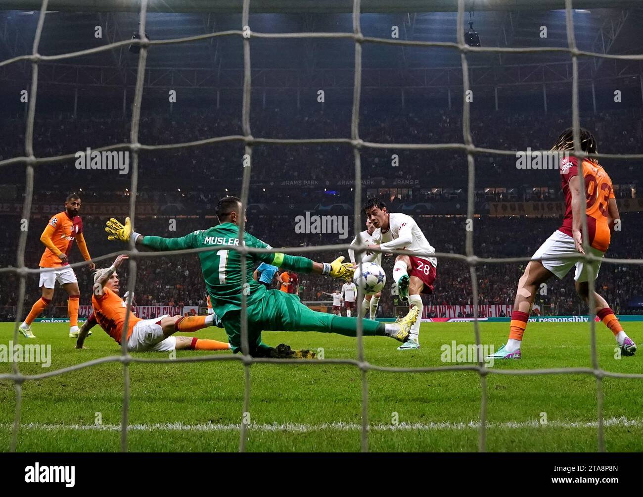 Galatasaray goalkeeper Fernando Muslera saves a shot from Manchester United's Facundo Pellistri during the UEFA Champions League Group A match at RAMS Park, Istanbul. Picture date: Wednesday November 29, 2023. Stock Photo