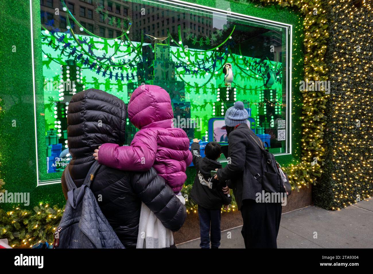Macy's holiday windows are always a popular tourist stop in Herald Square, New York City, USA  2023 Stock Photo