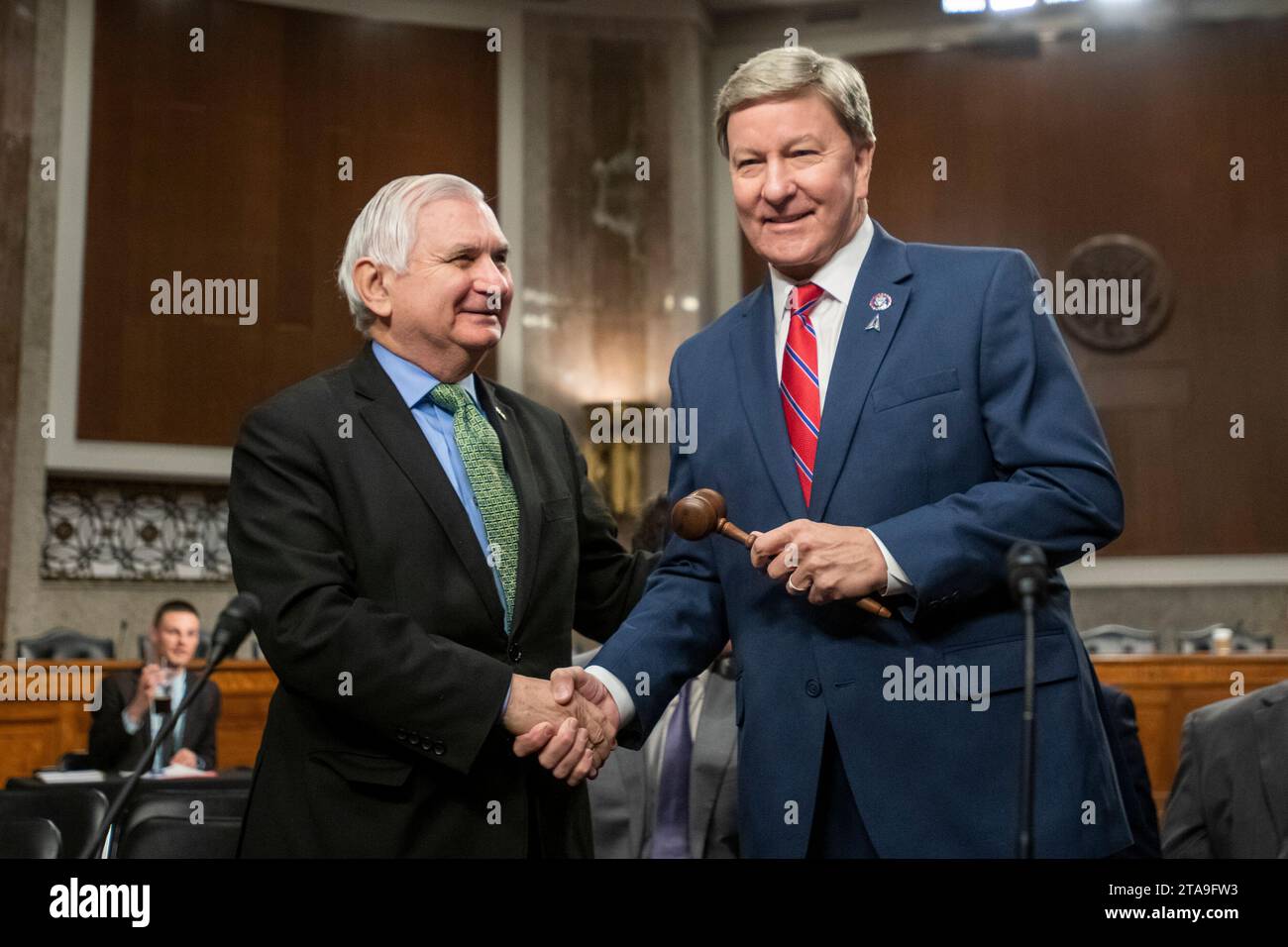 Washington, Vereinigte Staaten. 29th Nov, 2023. United States House Armed Services Chairman Mike Rogers (Republican of Alabama), right, receives the gavel from US Senate Armed Services Chairman Jack Reed (Democrat of Rhode Island) during a Joint Conference Committee meeting of conferees on the National Defense Authorization Act for Fiscal Year 2024, in the Dirksen Senate Office Building in Washington, DC, Wednesday, November 29, 2023. Credit: Rod Lamkey/CNP/dpa/Alamy Live News Stock Photo