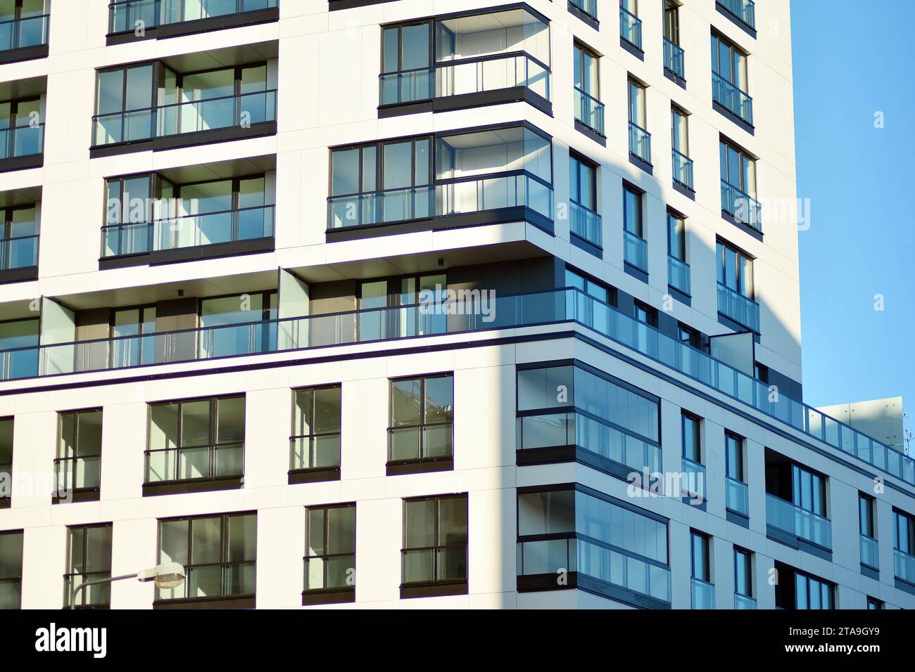 Image showcasing New apartment building with glass balconies. Modern architecture houses ...