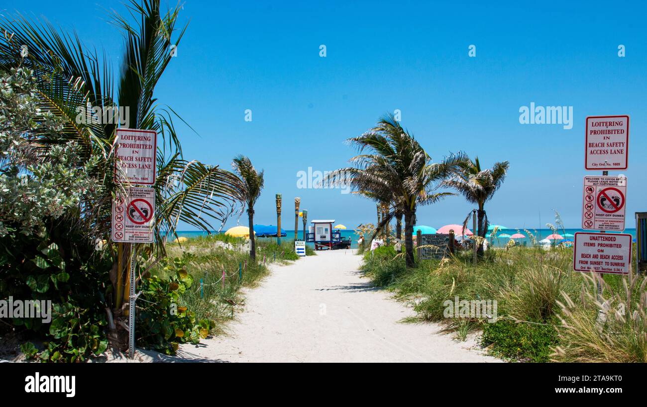 Cocoa Beach, Florida, USA 27 June 2023 A sandy path leading to a