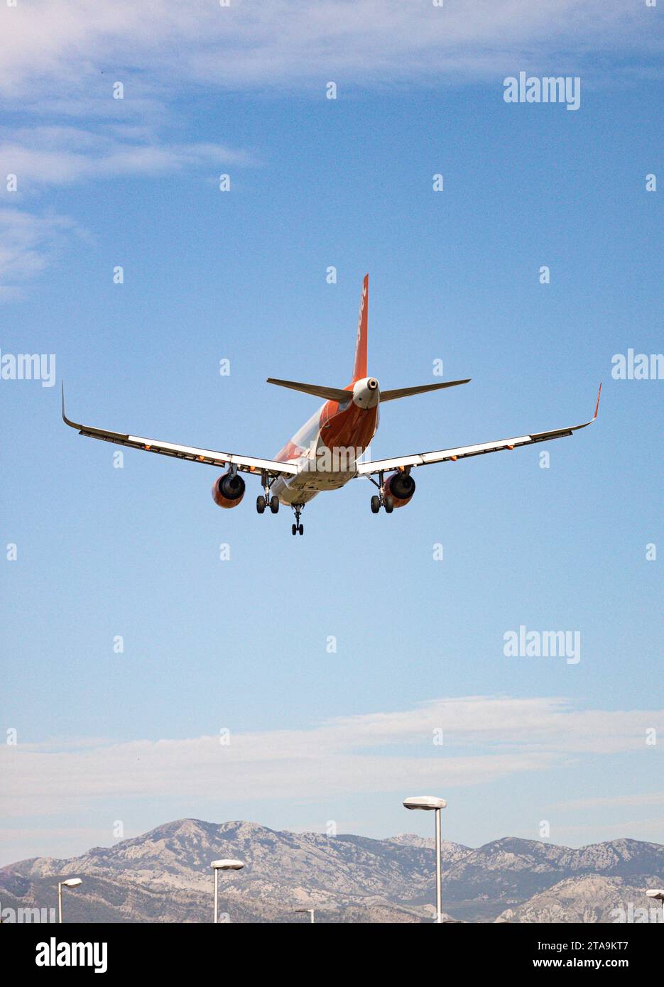 Airplane takes off from airport Stock Photo - Alamy