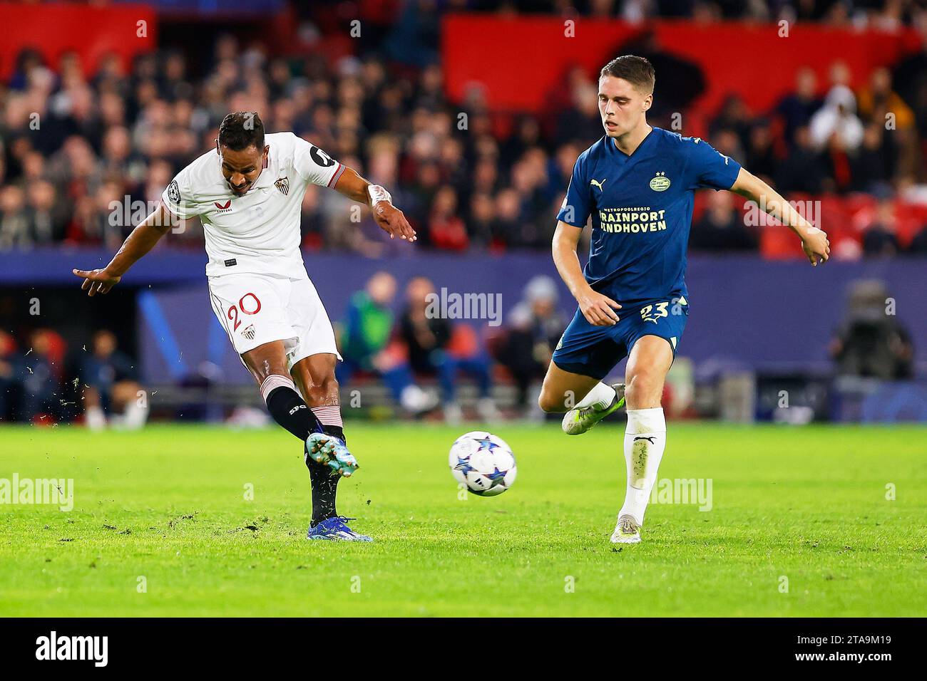 Seville, Spain. 29th Nov, 2023. Fernando (20) of Sevilla FC and Joey Veerman (23) of PSV Eindhoven seen during the UEFA Champions League match between Sevilla FC and PSV Eindhoven at Estadio Ramon Sanchez Pizjuan in Seville. (Photo Credit: Gonzales Photo/Alamy Live News Stock Photo