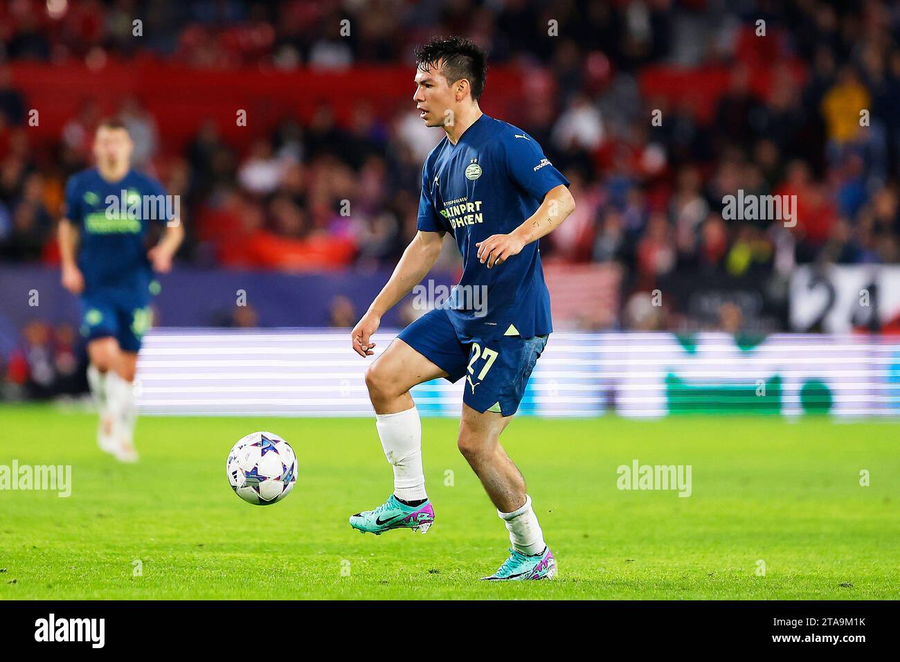 Seville, Spain. 29th Nov, 2023. Hirving Lozano (27) of PSV Eindhoven seen during the UEFA Champions League match between Sevilla FC and PSV Eindhoven at Estadio Ramon Sanchez Pizjuan in Seville. (Photo Credit: Gonzales Photo/Alamy Live News Stock Photo