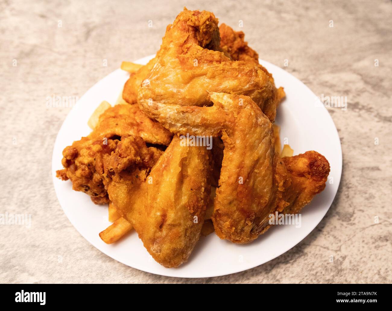 Whole fried chicken wings Stock Photo