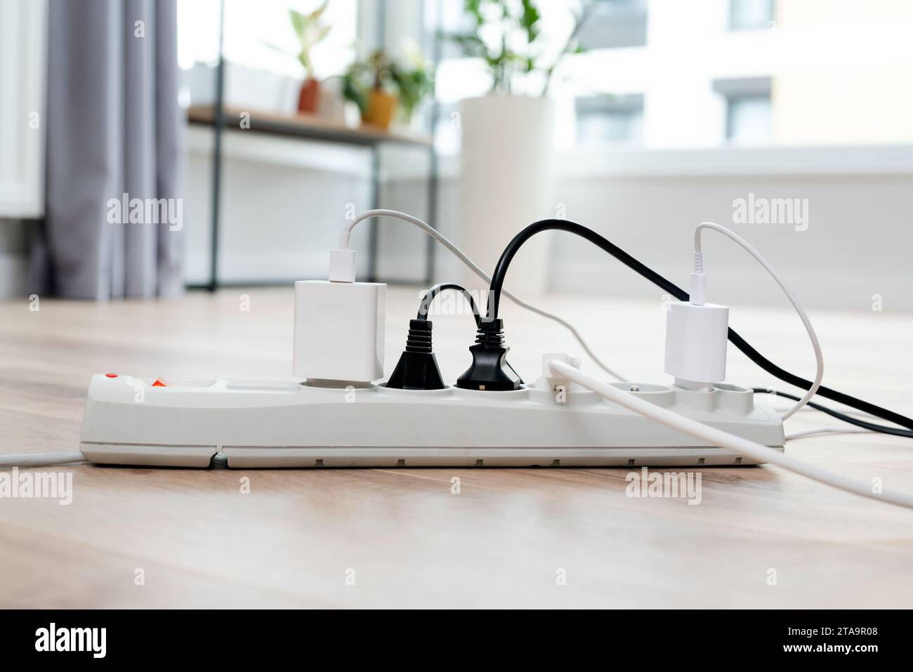 Electric plug put on multiple socket. Electrical equipment, electrical