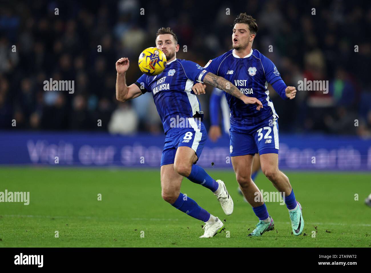 Cardiff, UK. 28th Nov, 2023. Joe Ralls of Cardiff City (l) and Ollie