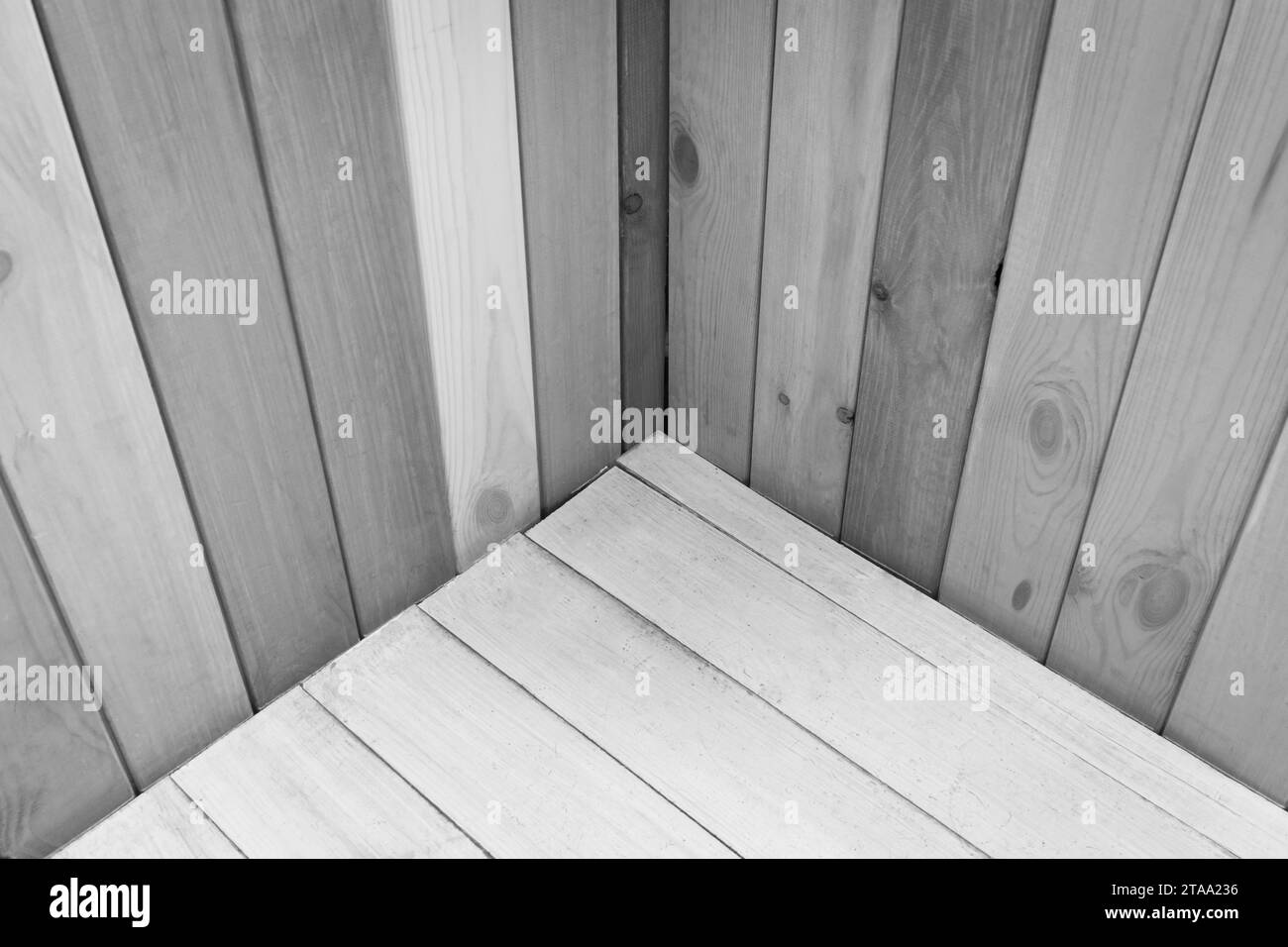 Wooden grey monochrome boards corner joint interior decor decoration design plank. Stock Photo