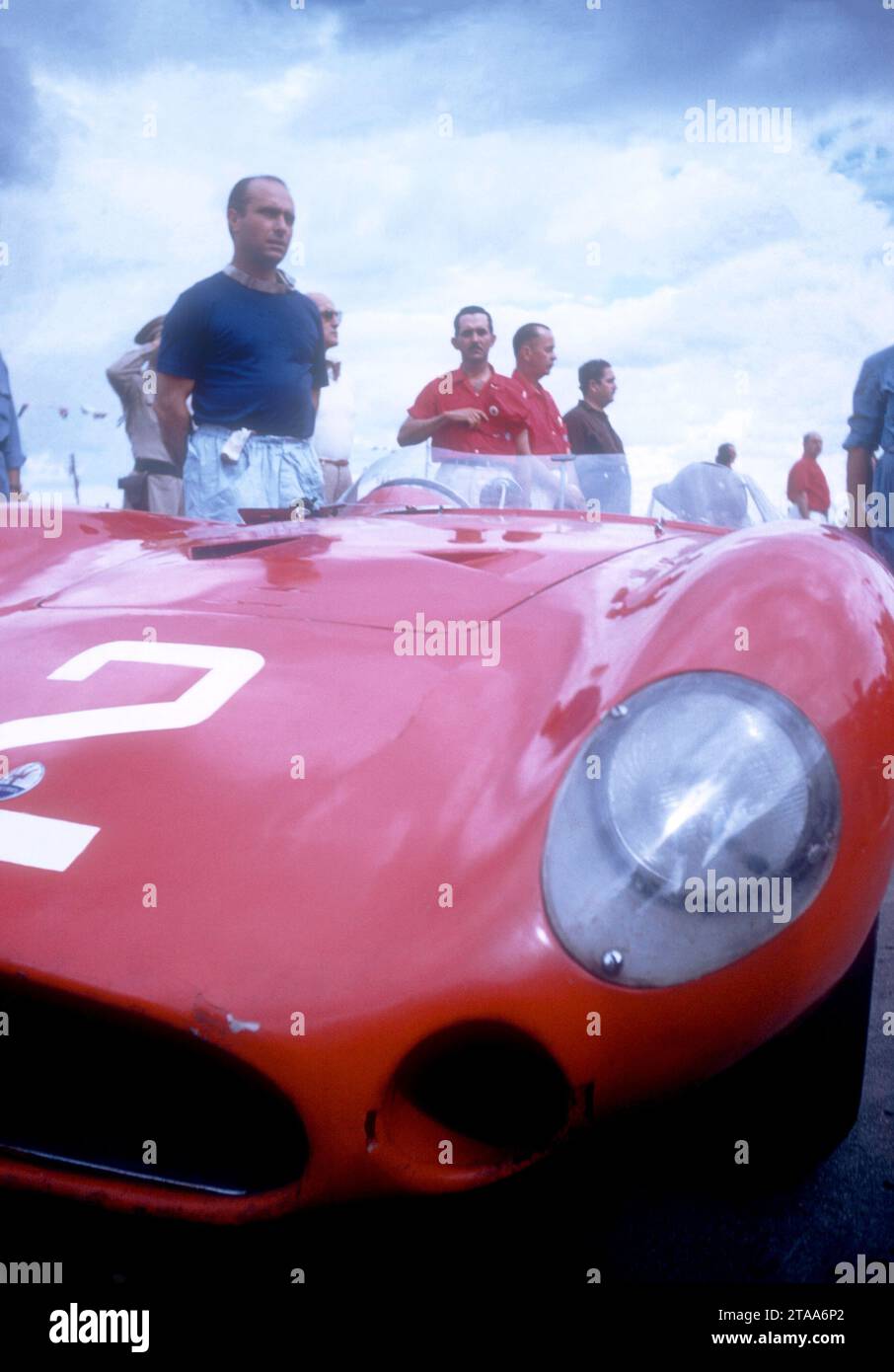 HAVANA, CUBA - FEBRUARY 24:  Juan Manuel Fangio (1911-1995) driver of the Maserati 300S stands next to his car after the 1957 Cuban Grand Prix on February 24, 1957 in Havana, Cuba.  Fangio won the race.  (Photo by Hy Peskin) *** Local Caption *** Juan Manuel Fangio Stock Photo