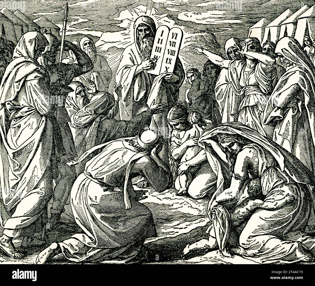 The 1895 caption reads: Moses and Ten Commandments.' Moses brought the people out of the camp to meet with God, and they stood at the foot of the mountain. God told Moses to come back up the mountain. He didn't want the people to come too close to the mountain. Then God spoke all the words of the 10 Commandments Stock Photo