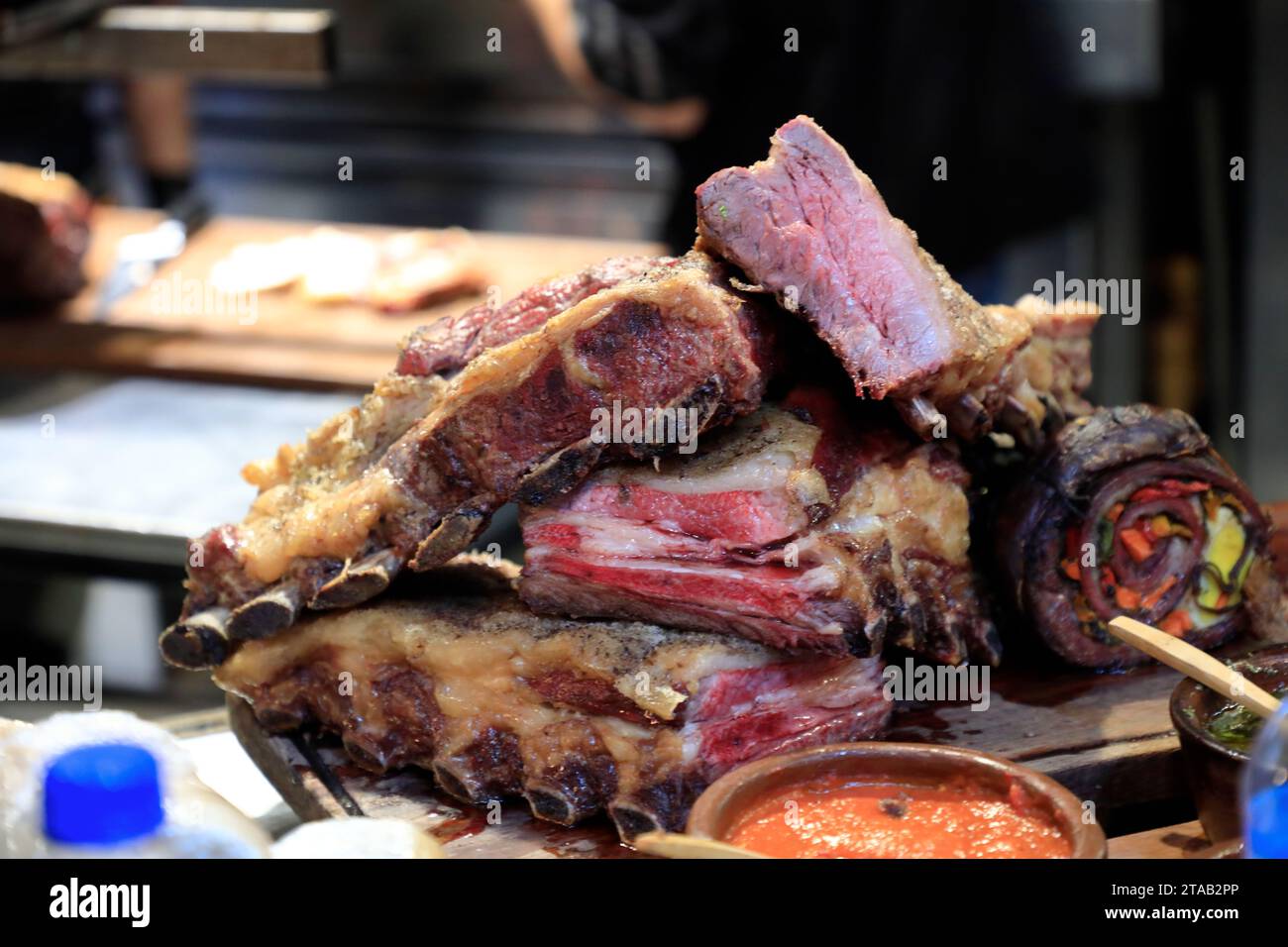 grilled beef ribs served in a restaurant inside of San Telmo Market.Buenos Aires.Argentina Stock Photo